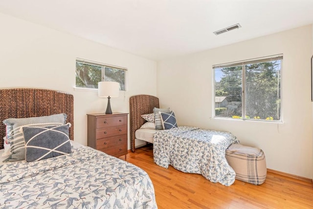 bedroom featuring wood-type flooring