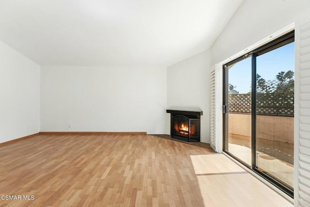 unfurnished living room featuring light hardwood / wood-style flooring