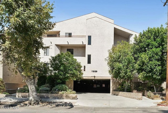 view of property featuring a garage