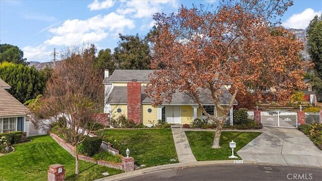 view of front of home with a front yard