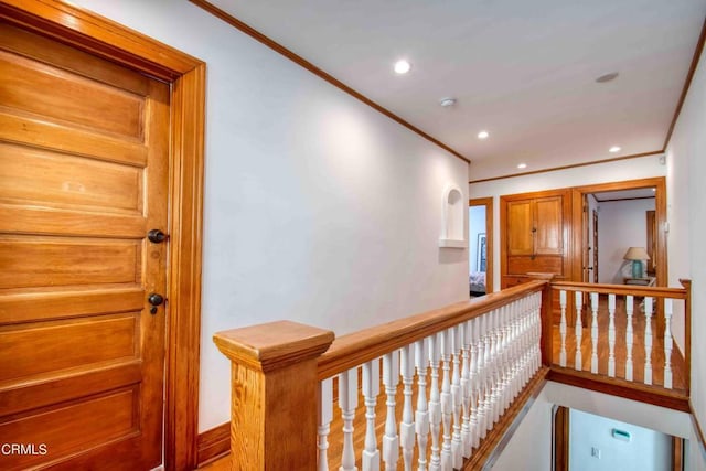 hallway featuring ornamental molding