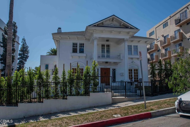 view of greek revival inspired property