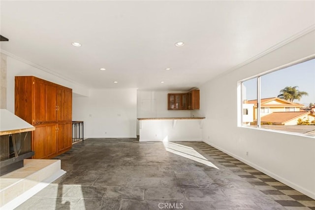 living room featuring crown molding