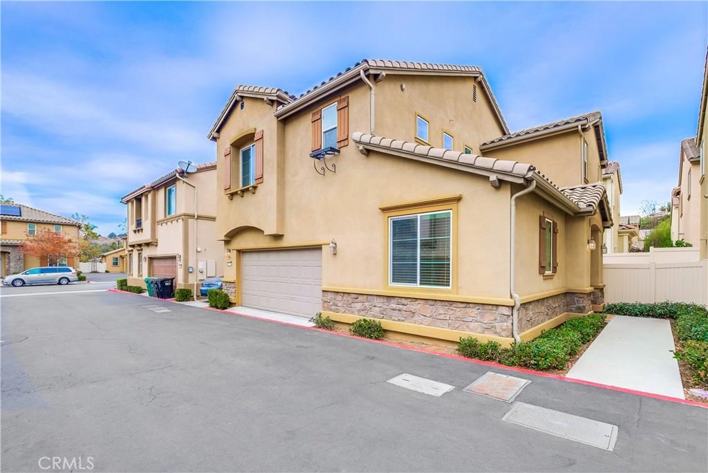 view of property exterior with a garage