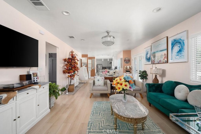 living room with light wood-type flooring