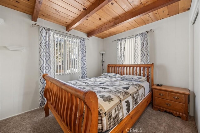 carpeted bedroom with wooden ceiling and beam ceiling