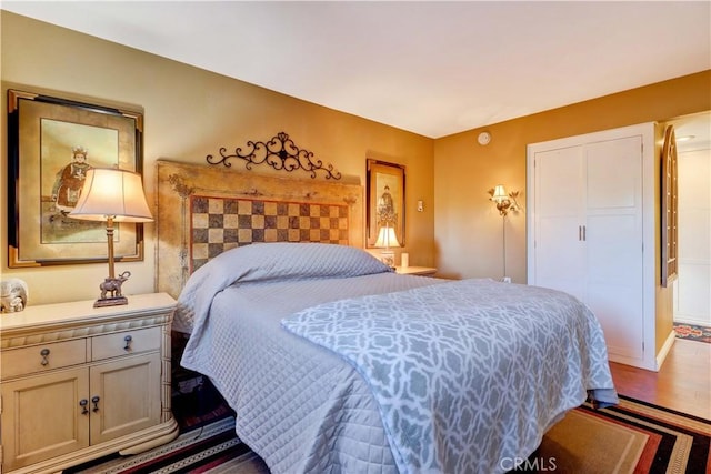 bedroom featuring hardwood / wood-style floors