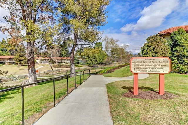 view of community featuring a yard