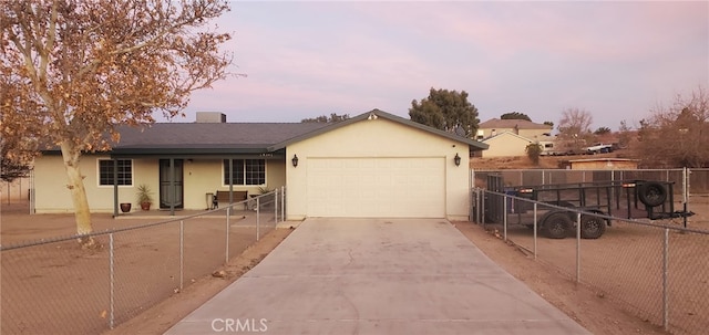 single story home with a garage