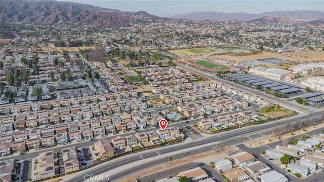 drone / aerial view featuring a mountain view