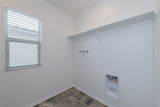 clothes washing area featuring washer hookup and gas dryer hookup