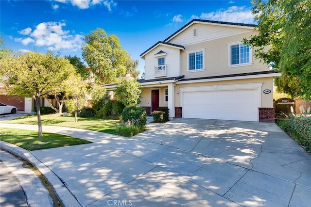 view of front property with a garage and a front yard