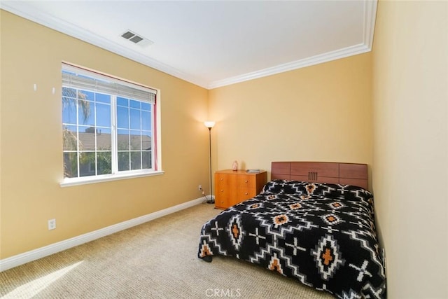 bedroom with carpet flooring and crown molding