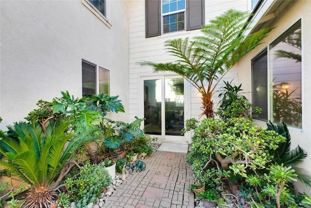 doorway to property featuring a patio area