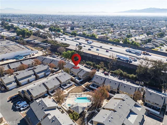 drone / aerial view featuring a mountain view