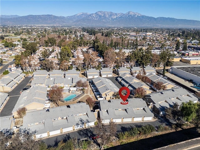 drone / aerial view featuring a mountain view