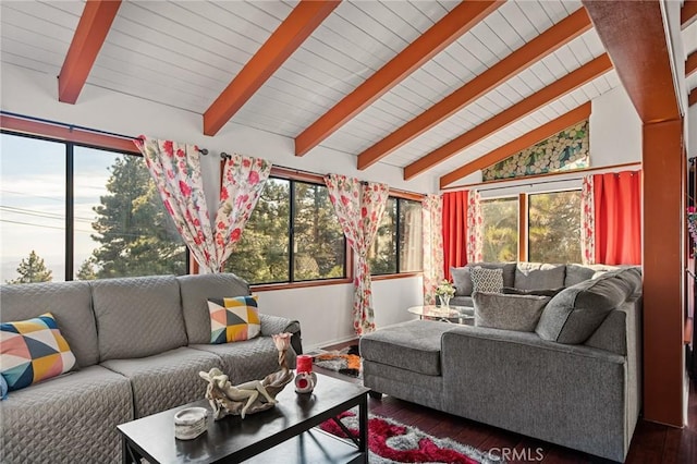 sunroom / solarium with wooden ceiling, plenty of natural light, and vaulted ceiling with beams