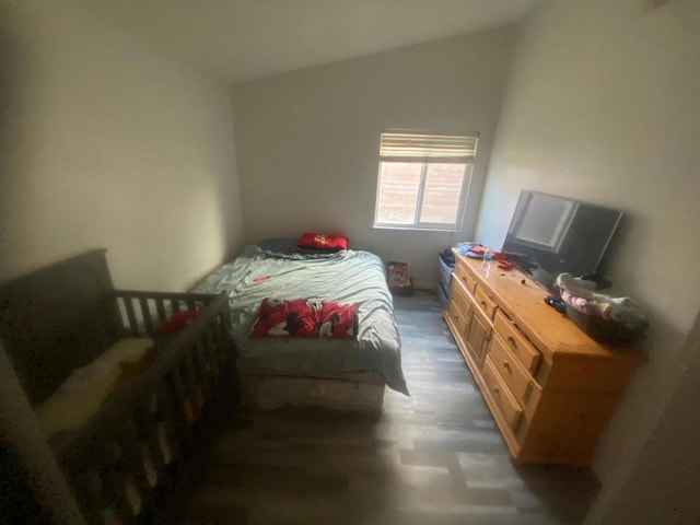 bedroom featuring lofted ceiling