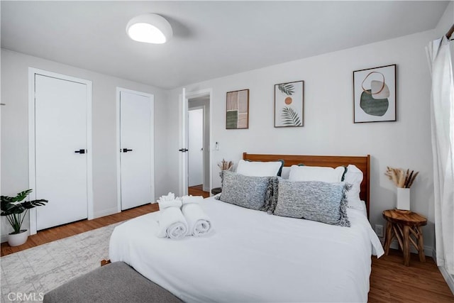 bedroom featuring hardwood / wood-style floors