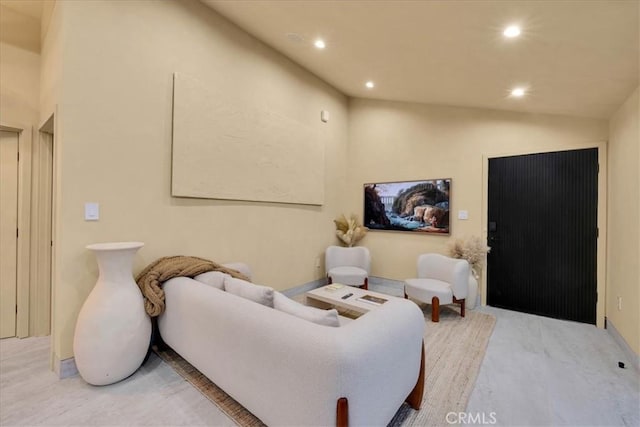 living room with lofted ceiling