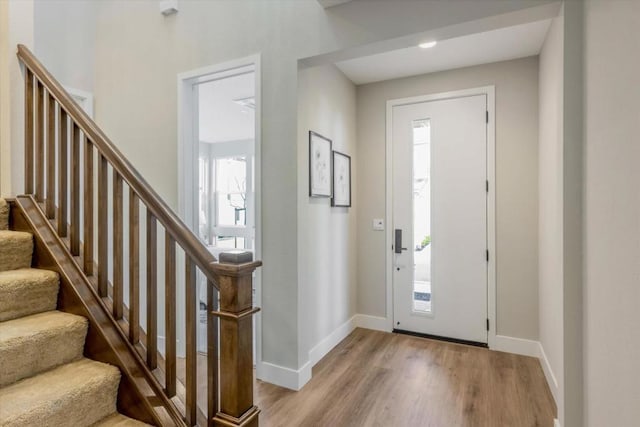 entryway with plenty of natural light and light wood-type flooring