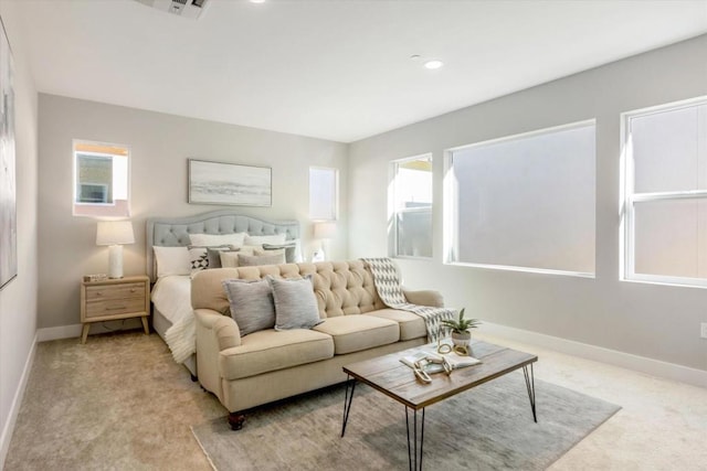 bedroom featuring light colored carpet