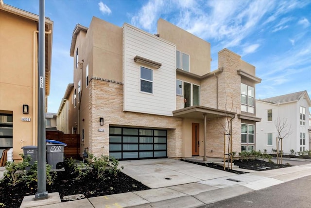 view of front of property with a garage