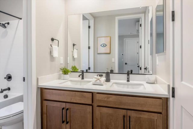 full bathroom with vanity, toilet, and tub / shower combination