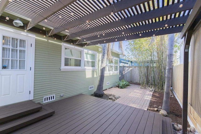 wooden deck with a pergola