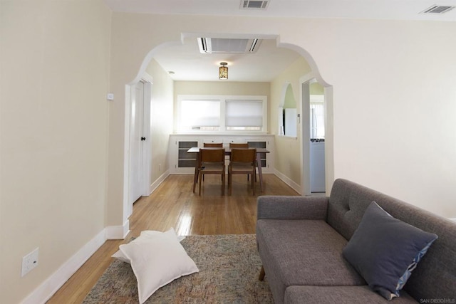 living room with wood-type flooring