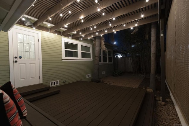 wooden terrace with a pergola