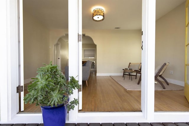 doorway to property featuring area for grilling