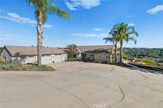 single story home with a garage