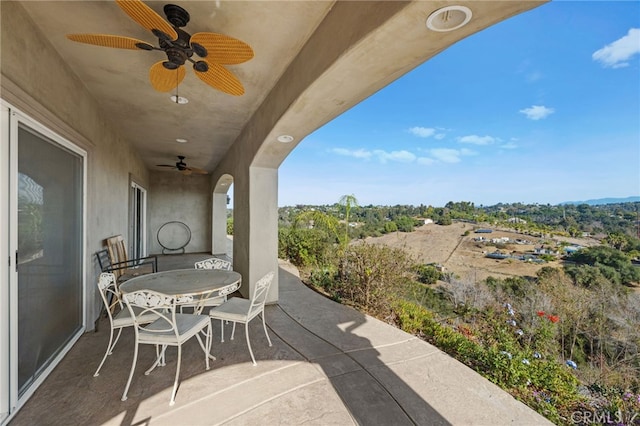 view of patio / terrace featuring ceiling fan