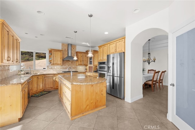 2240 Aqua Hill Rd, Fallbrook, CA 92028 - kitchen featuring wall chimney range hood, appliances with stainless steel finishes, decorative backsplash, light stone countertops, and recessed lighting