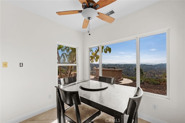 2240 Aqua Hill Rd, Fallbrook, CA 92028 - dining room with baseboards, a mountain view, and a ceiling fan