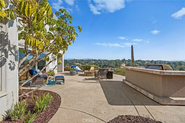 2240 Aqua Hill Rd, Fallbrook, CA 92028 - view of patio featuring an outdoor fire pit
