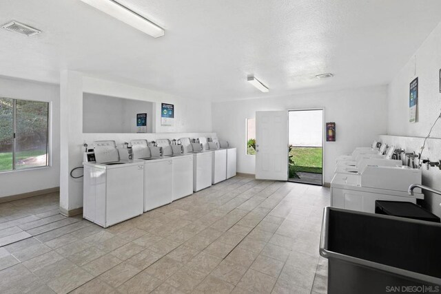 laundry area featuring washing machine and dryer