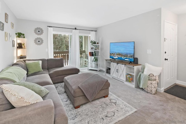 living room featuring light carpet