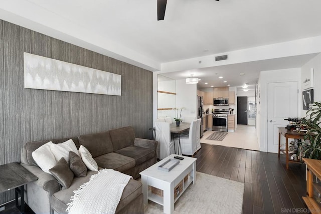 living room with hardwood / wood-style flooring