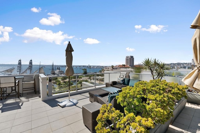 view of patio / terrace with a water view