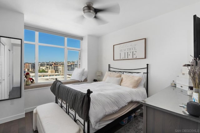 bedroom featuring ceiling fan and wood-type flooring