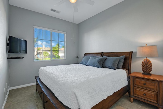 bedroom featuring ceiling fan and light tile patterned flooring