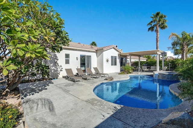 view of swimming pool with a pergola, a patio area, and an in ground hot tub