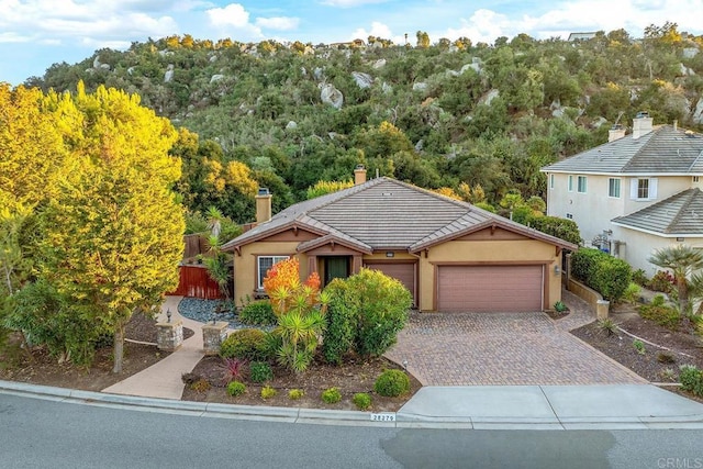 view of front of property with a garage