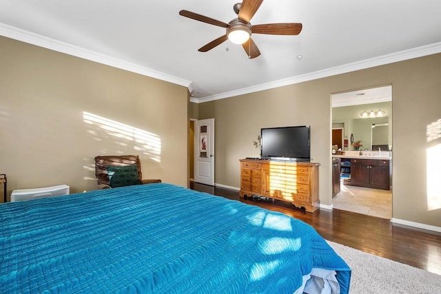 bedroom with ceiling fan, ensuite bath, wood-type flooring, crown molding, and multiple windows