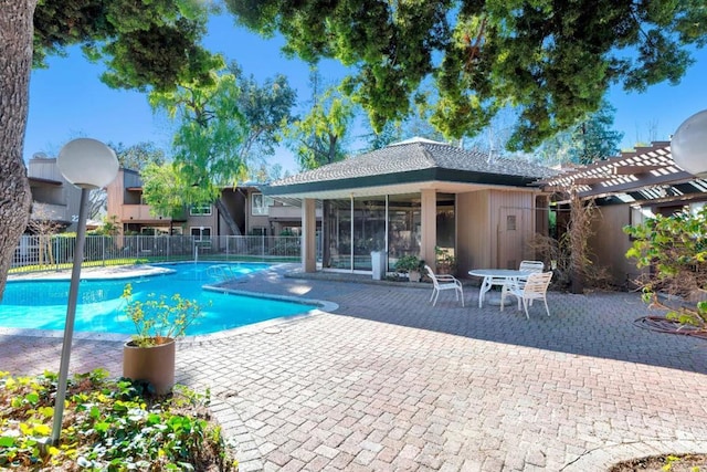 view of swimming pool featuring a patio