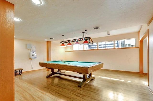 playroom with pool table and light hardwood / wood-style floors