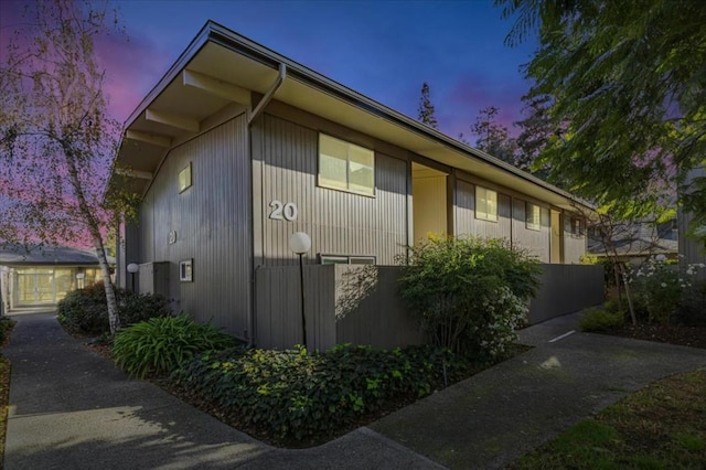 view of property exterior at dusk