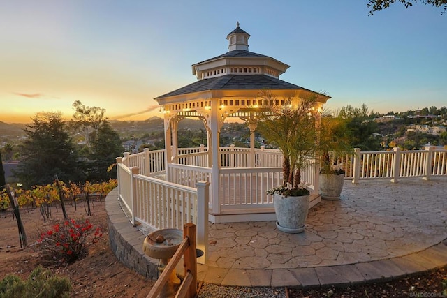 patio terrace at dusk with a gazebo